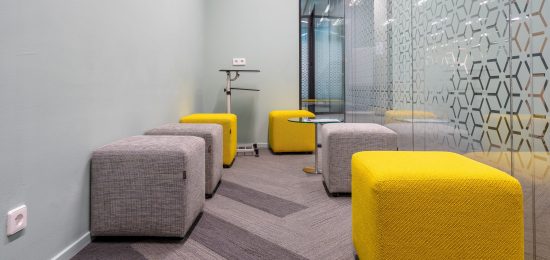 A corner of the open office space with a modern interior design
